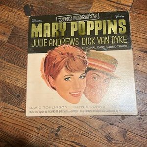 This is a Disney Album of Mary Poppins Julie Andrew’s and Dick Van Dyke